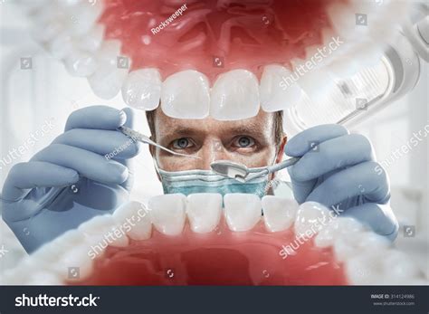 Stomatology Dentist Over Open Patients Mouth Stock Photo 314124986 ...