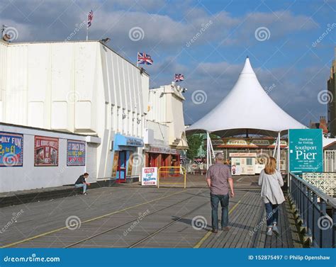 People Walking into the Entrance To Southport Pier in Merseyside with a ...