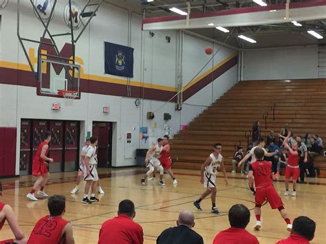 Redmen Basketball Stuns Maroons with 80-32 Victory