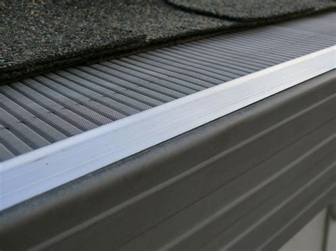 LeafsOut WIDE Micro Mesh Rain Gutter Guard for 6" Gutters, 23 Feet. DIY Install it yourself Leaf ...