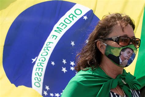 Jair Bolsonaro joins hundreds of anti-lockdown protesters in Brazil ...