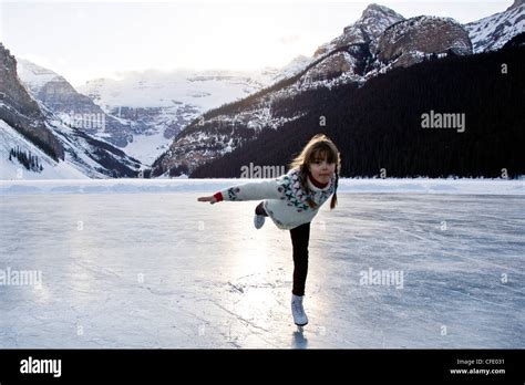 Young girl ice skating at Lake Louise, Banff National Park, Alberta, Canada Stock Photo - Alamy