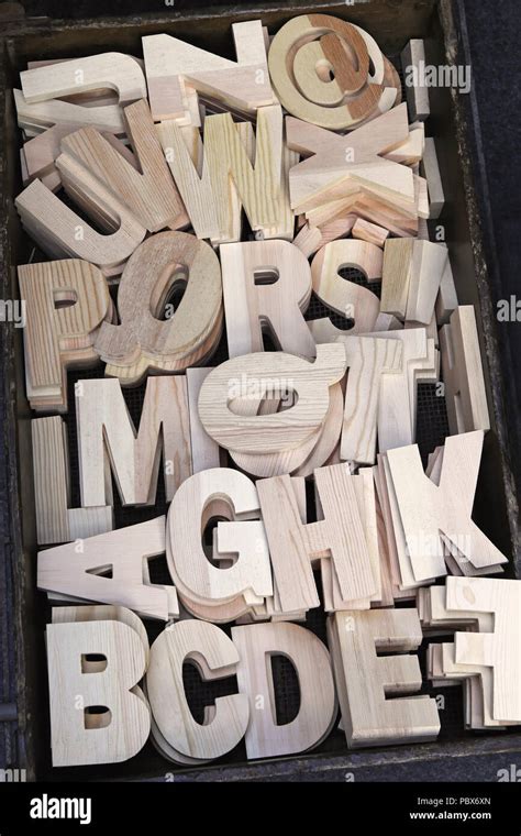 Letters od alphabet carved in 3d wood Stock Photo - Alamy