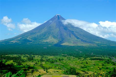 Mayon Volcano, Philippines. Perfect cone & shape | Natural landmarks, Favorite places, Places