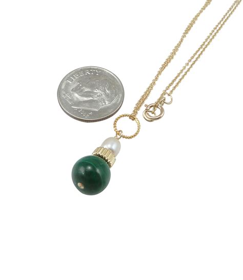 Malachite jewelry necklace features beautiful green malachite pendant