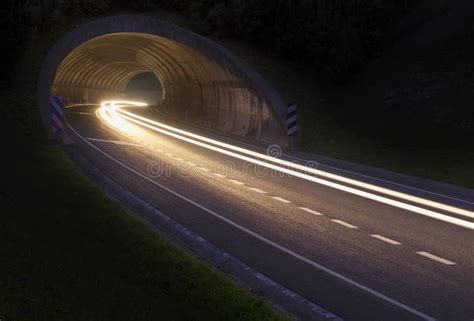 Lights of the Car on the Road To the Tunnel. Stock Image - Image of route, architecture: 78614047