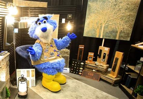 Toledo Walleye mascot, CatTrick, poses in Gross Electric's booth at the ...