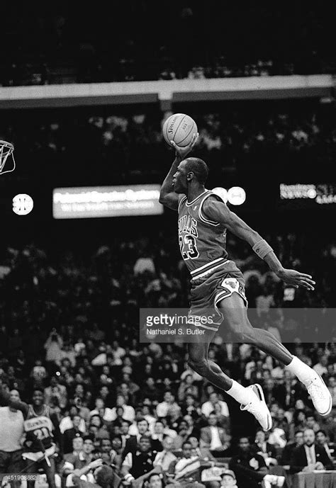 Michael Jordan #23 of the Chicago Bulls attempts a dunk during the 1988 ...