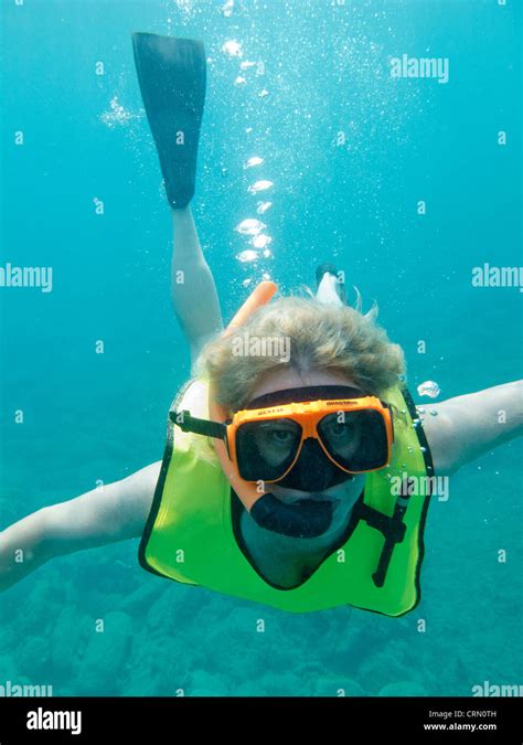 Snorkeling off of St. Maarten Stock Photo - Alamy