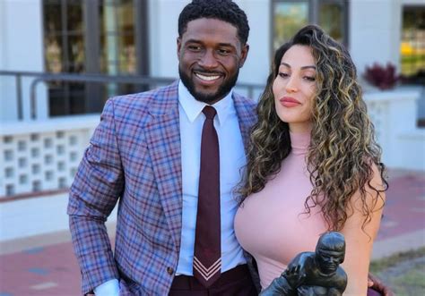 Ex-NFL RB Reggie Bush And Wife Lilit Bush Pose With His Heisman Trophy While Rocking Matching ...