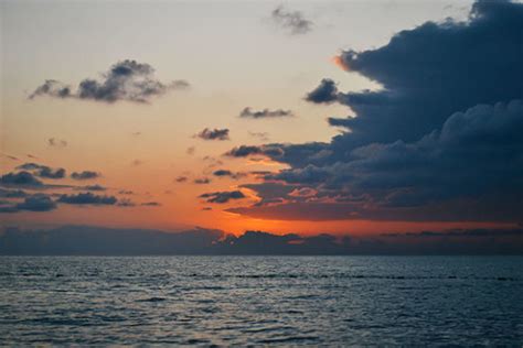 Sunset on the Sea and Beautiful Clouds Graphic by giorgadzephotography · Creative Fabrica