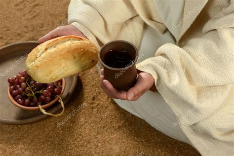 Jesus Hands Holding Bread and Wine Stock Photo by ©ginosphotos1 18415285