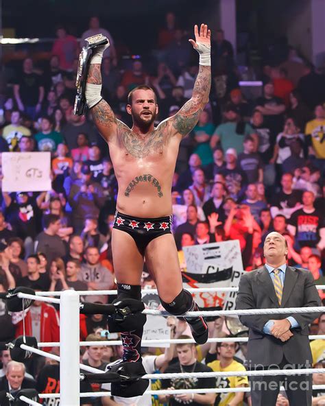 CM Punk and Paul Heyman Photograph by Wrestling Photos - Pixels