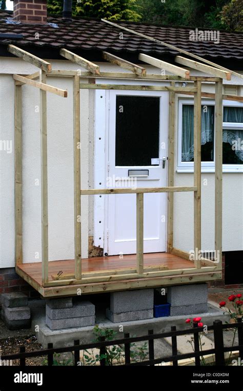 Timber Frame of a Lean-to porch during it's construction Stock Photo ...