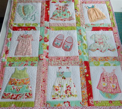 Tiny little dresses: a quilt for a new baby girl – handmade by Carole Carr