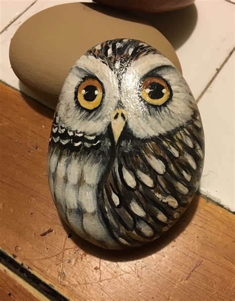 Owl painted on a rock | Mandala rock art, Owl painting, Pet rocks