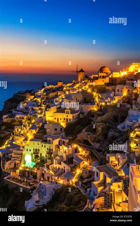 Oia Santorini colorful sunset Stock Photo - Alamy