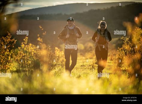 Couple hiking at Mount Rogers in Virginia Stock Photo - Alamy