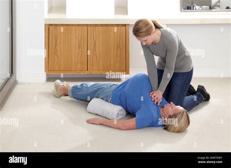 Chest compressions woman hi-res stock photography and images - Alamy