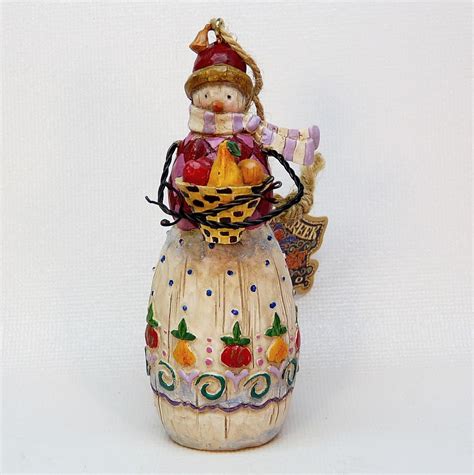 Jim Shore Christmas ornament snowman with fruit bowl B113110 2003