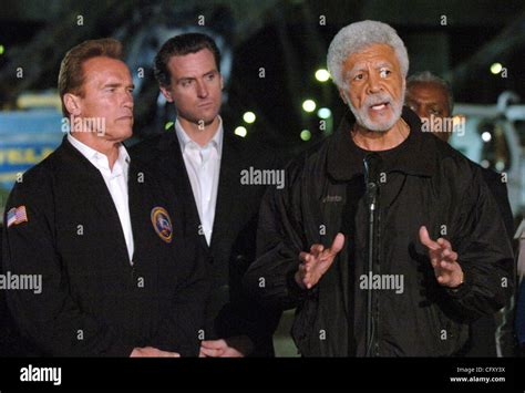 Oakland Mayor Ron Dellums (right) speaks while Governor Arnold ...