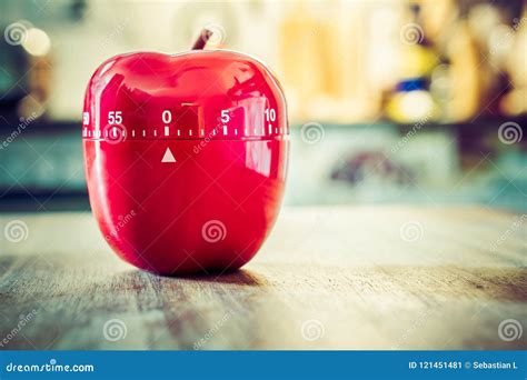 0 Minutes - 1 Hour - Red Kitchen Egg Timer in Apple Shape on a Table Stock Image - Image of blue ...