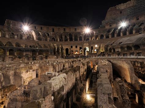 Premium Photo | Colosseum rome interior view at night