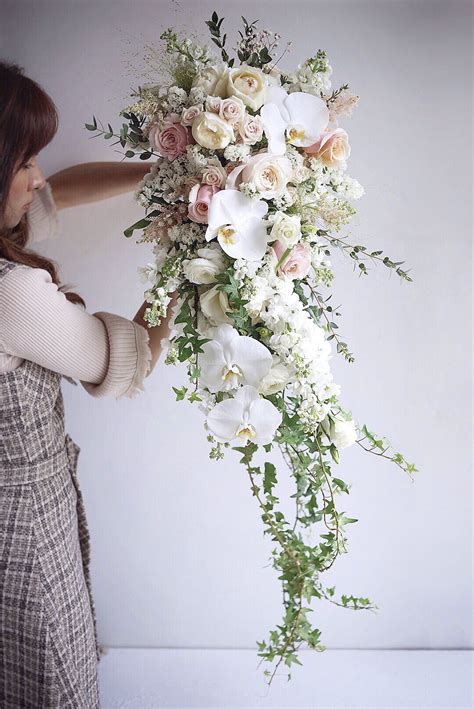 Pin by LemongrassWedding on Fresh flower waterfall bouquet | Elegant bridal bouquets, White ...