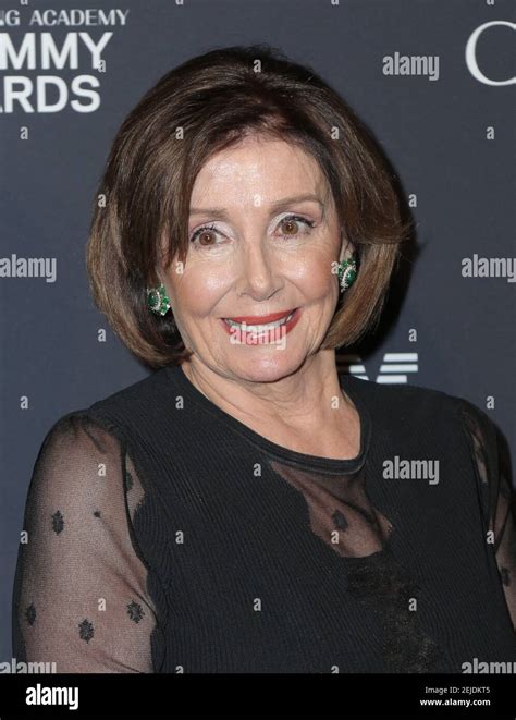 Nancy Pelosi walking the red carpet at the Clive Davis' 2020 Pre-Grammy ...