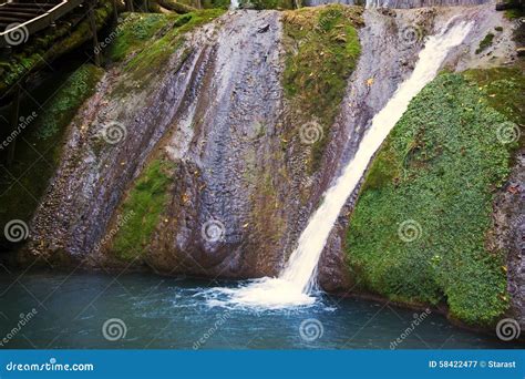 Waterfall And Blue Lagoon Stock Photo - Image: 58422477