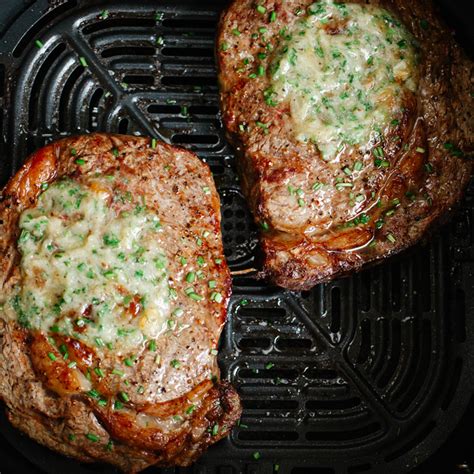 Sink Your Teeth into the Perfect Air Fryer Ribeye Steak with Garlic Butter - Rowdy Hog Smokin BBQ