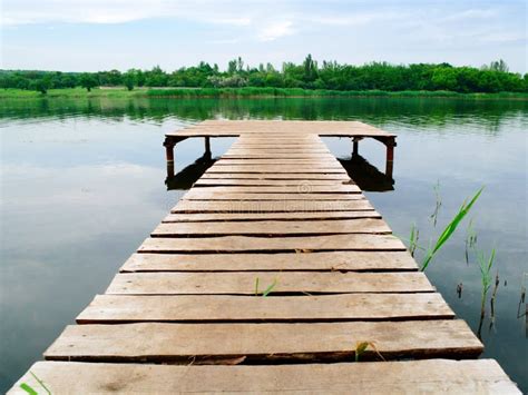 Wooden pier stock photo. Image of reflection, lonely - 16051788