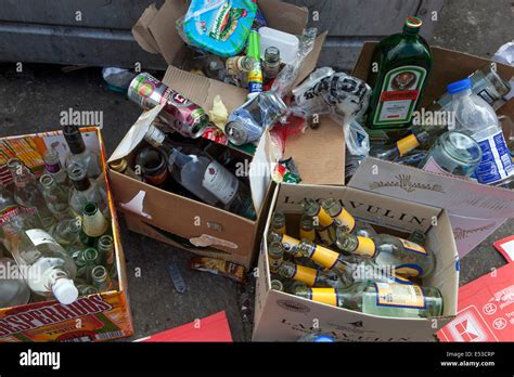 Empty bottles party, alcohol bottles after party, garbage Stock Photo ...