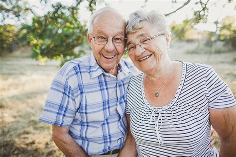 "Cute Elderly Couple Smiling Together Outside" by Stocksy Contributor ...