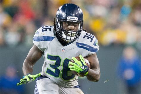 Alex Collins finds redemption in second chance with Seahawks - Sports Illustrated Seattle ...