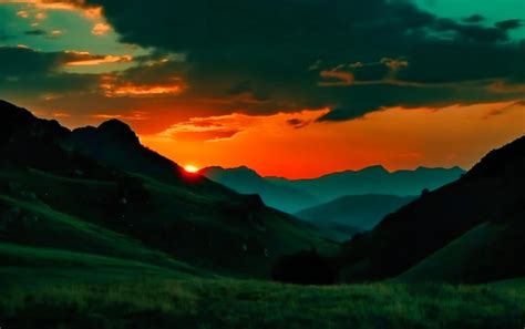 Premium Photo | Silhouette of mountains at sunset