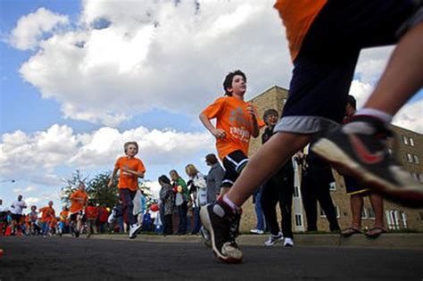 From the Kids Fun Run to the Kalamazoo Marathon, share your photos from this weekend's races ...