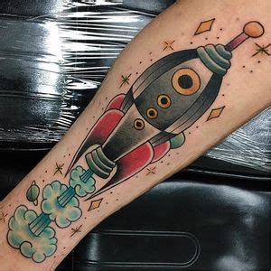 Tattoo uploaded by Xavier • Rocket tattoo by briebrutal on Instagram. #rocketship #space • Tattoodo