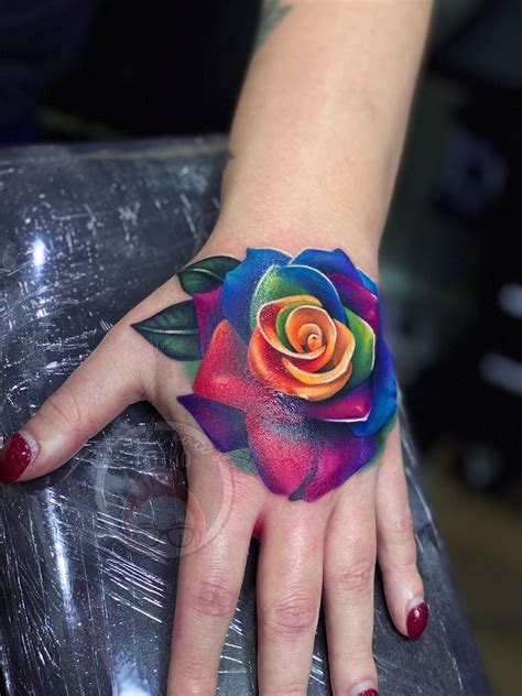 Rainbow rose tattoo | Rose tattoo, Ink tattoo, Rose hand tattoo