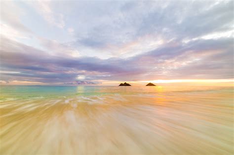 Lanikai Sunrise - A serene and beautiful sunrise view of the Na Mokulua islands just off the ...