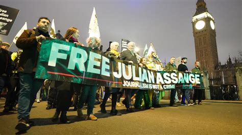 Julian Assange supporters participate in London 'night carnival' to ...