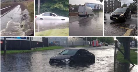 Edinburgh flooding: Watch as cyclist braves deep water, trains are stranded and cars float in ...