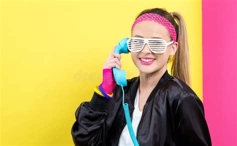 Woman in 1980`s Fashion with Old Fashioned Phone Stock Image - Image of ...