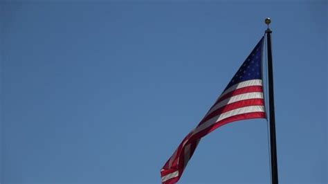 American Flag Flying Slow Motion Over Stock Footage Video (100% Royalty-free) 1017602920 ...