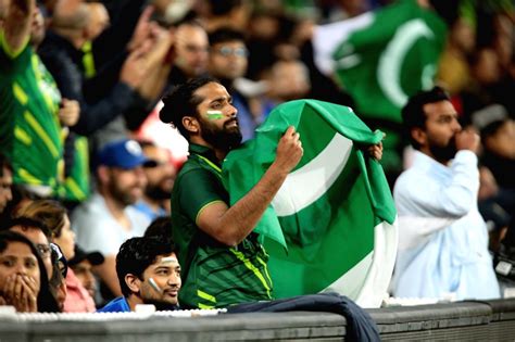 Melbourne : Pakistani cricket fans cheering for their team during the match