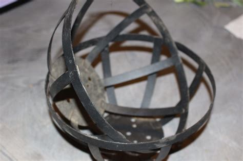 How To Make A Metal Garden Sphere From Thrift Store Find | Garden spheres, Thrift store decor ...