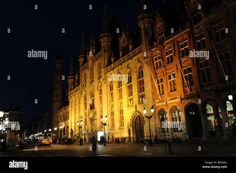 Grote Markt at night with Governor House the Provincial Court and Post Office at Bruges in ...