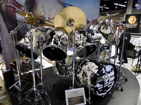 a drum set is on display at an exhibit