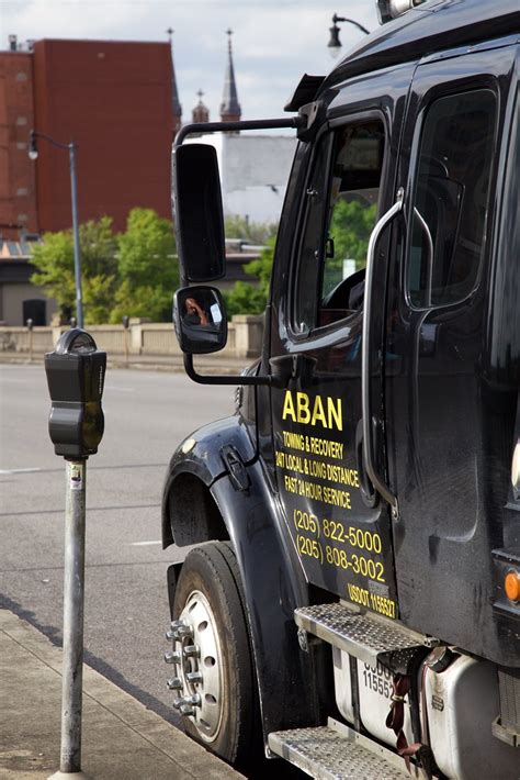 Call Waiting | Tow truck driver marking his time awaiting a … | Flickr