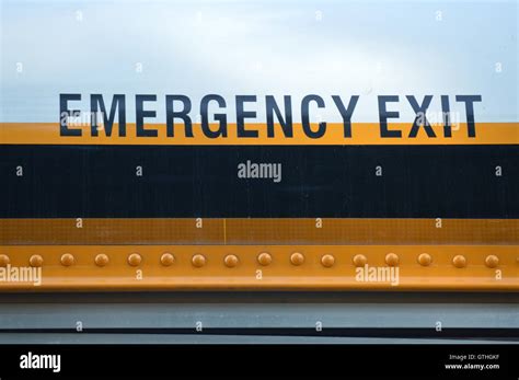 Emergency Exit sign on a school bus Stock Photo - Alamy